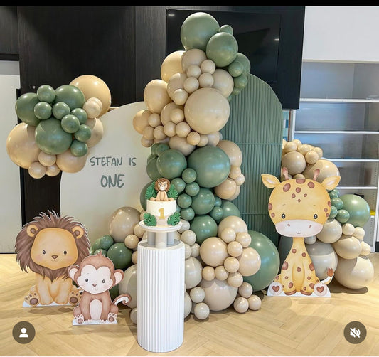 Safari animal foam board cutouts for kids birthday by Paper n Co Melbourne
Jungle themed baby shower decor with lion and giraffe cutouts
Wild One safari party backdrop with animal foam board standees